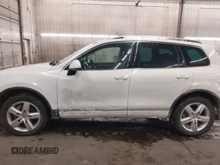 2013 Volkswagen Touareg Lux with VIN WVGEF9BP5DD011511, listed as a IAAI auction lot 41608840 with 167,350 mi miles and . Bid and sale history available at DreamBid. Image 15.