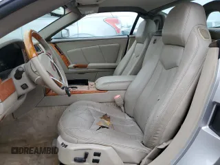 2004 Cadillac XLR z VIN 1G6YV34A545602056, wystawiony jako Copart lot #66506514 z przebiegiem Nie podano mil oraz Nie do naprawy. Historia ofert i sprzedaży dostępna na DreamBid. Obrazek 7.