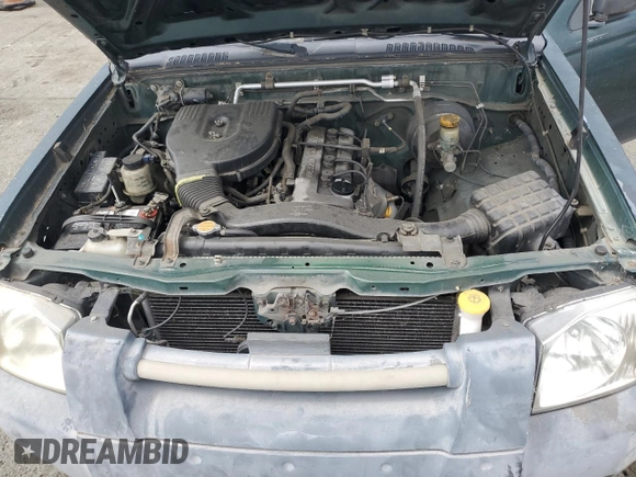 2002 Nissan Frontier XE with VIN 1N6DD26S12C332098, listed as a Copart auction lot 54601975 with 316,966 mi miles and Clean title. Bid and sale history available at DreamBid. Image 11.