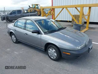 1997 Saturn SL with VIN 1G8ZH5285VZ117635, listed as a IAAI auction lot 42153929 with 193,224 mi miles and . Bid and sale history available at DreamBid. Image 1.