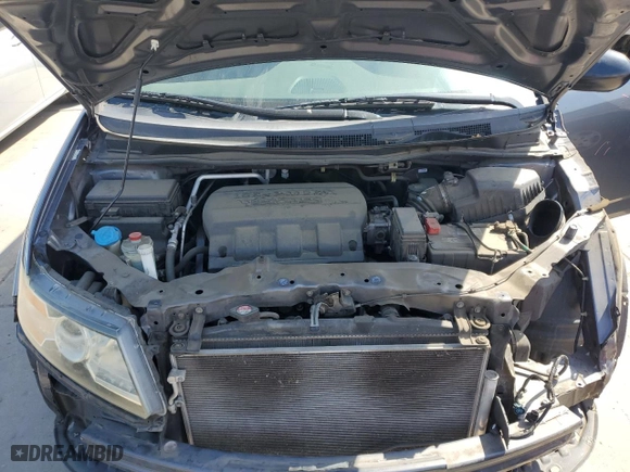 2014 Honda Odyssey LX with VIN 5FNRL5H29EB101385, listed as a Copart auction lot 53571095 with 137,067 mi miles and Salvage Title. Bid and sale history available at carsss.com. Image 12.