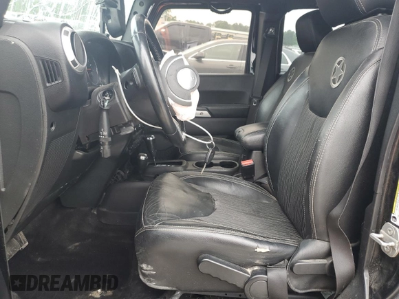 2015 Jeep Wrangler Unlimited Freedom with VIN 1C4BJWDG6FL568583, listed as a Copart auction lot 54266315 with Not provided miles and Salvage title. Bid and sale history available at DreamBid. Image 7.
