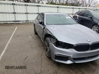2018 BMW 5 Series M550i xDrive with VIN WBAJB9C54JB286707, listed as a Copart auction lot 49158435 with 74,307 mi miles and Salvage title. Bid and sale history available at DreamBid. Image 10.