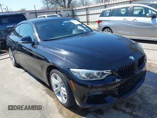 2015 BMW 4 Series 428i xDrive with VIN WBA3N5C50FK197765, listed as a IAAI auction lot 41730316 with 92,958 mi miles. Bid and sale history available at carsss.com. Image 1.