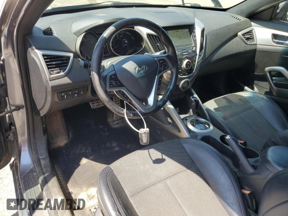 2016 Hyundai Veloster z VIN KMHTC6AD4GU273160, wystawiony jako Copart lot #52107985 z przebiegiem 120 884 mil mil oraz Szkoda całkowita • Salvage title. Historia ofert i sprzedaży dostępna na DreamBid. Obrazek 8.