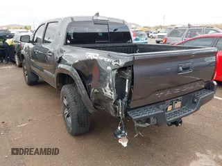2018 Toyota Tacoma SR5 with VIN 3TMAZ5CN0JM061233, listed as a IAAI auction lot 41944668 with 94,314 mi miles and . Bid and sale history available at DreamBid. Image 3.