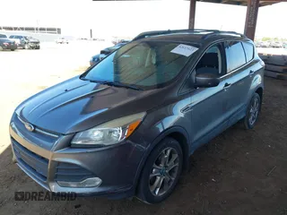 2014 Ford Escape SE z VIN 1FMCU9GX1EUA28135, wystawiony jako IAAI lot #42617623 z przebiegiem 144 824 mil mil oraz . Historia ofert i sprzedaży dostępna na DreamBid. Obrazek 6.