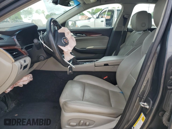 2014 Cadillac CTS AWD with VIN 1G6AW5SX9E0133215, listed as a Copart auction lot 61052055 with 179,614 mi miles and Salvage title. Bid and sale history available at DreamBid. Image 7.