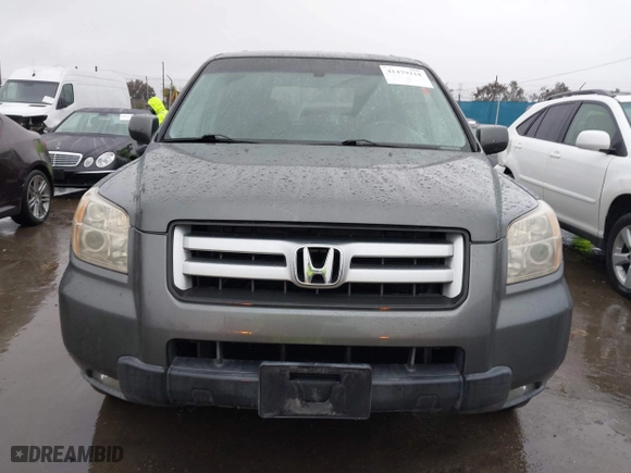 2007 Honda Pilot EX-L with VIN 5FNYF28617B024003, listed as a IAAI auction lot 41479218 with 201,868 mi miles. Bid and sale history available at carsss.com. Image 12.