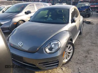 2017 Volkswagen Beetle 1.8T SE with VIN 3VWJ17AT5HM615698, listed as a IAAI auction lot 41099515 with 26,111 mi miles. Bid and sale history available at carsss.com. Image 12.