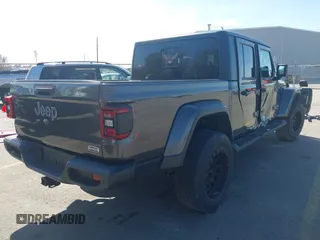 2021 Jeep Gladiator Overland z VIN 1C6HJTFG3ML588042, wystawiony jako IAAI lot #41730427 z przebiegiem 22 344 mil mil oraz . Historia ofert i sprzedaży dostępna na DreamBid. Obrazek 4.