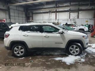 2020 Jeep Compass Latitude with VIN 3C4NJDBB3LT138454, listed as a IAAI auction lot 41614631 with 82,079 mi miles and . Bid and sale history available at DreamBid. Image 13.