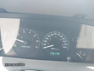 2004 Jeep Grand Cherokee Laredo with VIN 1J4GX48SX4C151160, listed as a IAAI auction lot 42765441 with 176,179 mi miles and . Bid and sale history available at DreamBid. Image 7.