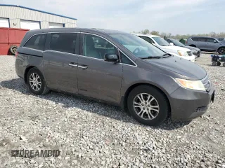2013 Honda Odyssey EX-L with VIN 5FNRL5H61DB030264, listed as a Copart auction lot 50453505 with 182,015 mi miles and Salvage Title. Bid and sale history available at carsss.com. Image 4.