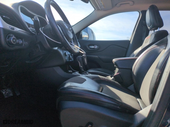 2015 Jeep Cherokee Trailhawk with VIN 1C4PJMBS6FW778665, listed as a Copart auction lot 48158035 with 107,638 mi miles and Salvage Title. Bid and sale history available at carsss.com. Image 7.