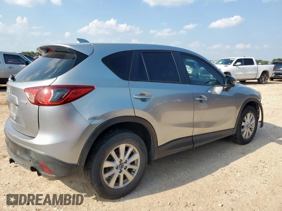 2013 Mazda CX-5 Sport with VIN JM3KE2BE5D0129797, listed as a Copart auction lot 58051185 with 200,712 mi miles and Salvage title. Bid and sale history available at DreamBid. Image 3.