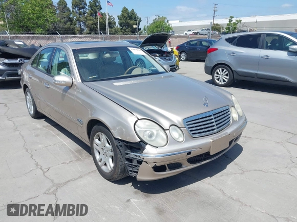 2003 Mercedes-Benz E-Class 3.2L with VIN WDBUF65JX3A236768, listed as a IAAI auction lot 42094824 with 251,896 mi miles. Bid and sale history available at carsss.com. Image 6.