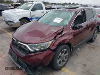 2019 Honda CR-V EX-L with VIN 7FARW1H83KE017311, listed as a IAAI auction lot 41513670 with 87,196 mi miles. Bid and sale history available at carsss.com. Image 2.
