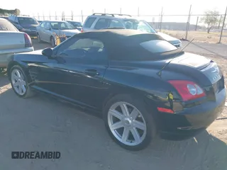 2005 Chrysler Crossfire with VIN 1C3AN55L55X051986, listed as a IAAI auction lot 41288735 with 97,853 mi miles and . Bid and sale history available at DreamBid. Image 3.