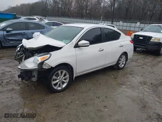 2017 Nissan Versa Sedan SV with VIN 3N1CN7AP1HL856590, listed as a IAAI auction lot 41555911 with 198,837 mi miles. Bid and sale history available at carsss.com. Image 2.