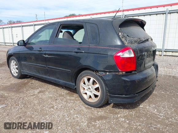2005 Kia Spectra with VIN KNAFE161555093364, listed as a IAAI auction lot 41465930 with 190,769 mi miles. Bid and sale history available at carsss.com. Image 3.