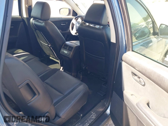 2014 Mazda CX-9 Touring with VIN JM3TB2CV4E0430932, listed as a IAAI auction lot 41992552 with 133,989 mi miles and . Bid and sale history available at carsss.com. Image 8.