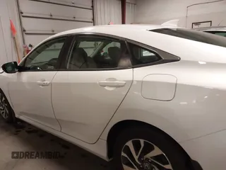 2018 Honda Civic EX with VIN 19XFC2F74JE005647, listed as a IAAI auction lot 41938607 with 90,263 mi miles and . Bid and sale history available at DreamBid. Image 15.