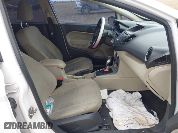 2017 Ford Fiesta SE with VIN 3FADP4BJXHM167605, listed as a IAAI auction lot 40510179 with 76,091 mi miles and . Bid and sale history available at DreamBid. Image 5.