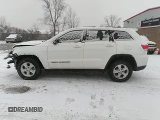 2017 Jeep Grand Cherokee Laredo with VIN 1C4RJEAG9HC854492, listed as a IAAI auction lot 41184619 with 134,839 mi miles. Bid and sale history available at carsss.com. Image 14.