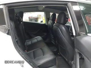 2020 Tesla Model 3 Standard Range Plus with VIN 5YJ3E1EA7LF805828, listed as a IAAI auction lot 41841505 with 44,946 mi miles and . Bid and sale history available at DreamBid. Image 8.