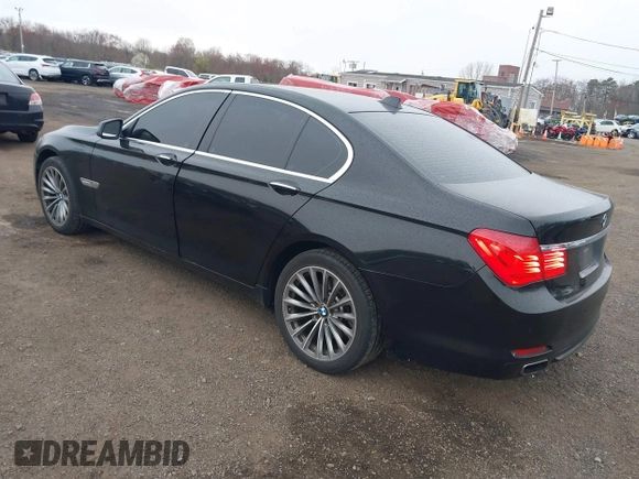2011 BMW 7 Series 740i with VIN WBAKA4C55BC612584, listed as a IAAI auction lot 42021367 with 139,190 mi miles. Bid and sale history available at carsss.com. Image 3.