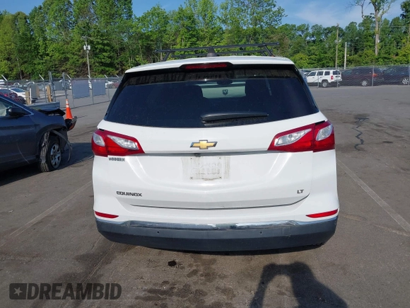 2019 Chevrolet Equinox LT z VIN 3GNAXKEV8KS599992, wystawiony jako IAAI lot #42159136 z przebiegiem 85 522 mil mil oraz . Historia ofert i sprzedaży dostępna na DreamBid. Obrazek 16.