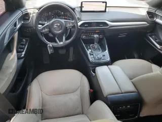 2023 Mazda CX-9 Grand Touring z VIN JM3TCBDY4P0633408, wystawiony jako Copart lot #57242685 z przebiegiem 28 859 mil mil oraz Szkoda całkowita • Salvage title. Historia ofert i sprzedaży dostępna na DreamBid. Obrazek 8.