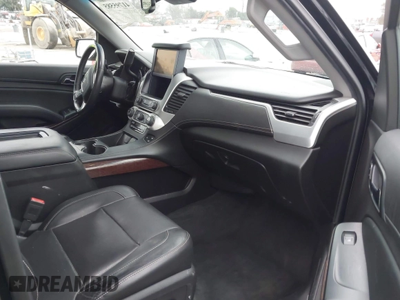 2015 GMC Yukon SLT with VIN 1GKS1BKC3FR129173, listed as a IAAI auction lot 41795585 with 97,893 mi miles. Bid and sale history available at carsss.com. Image 5.