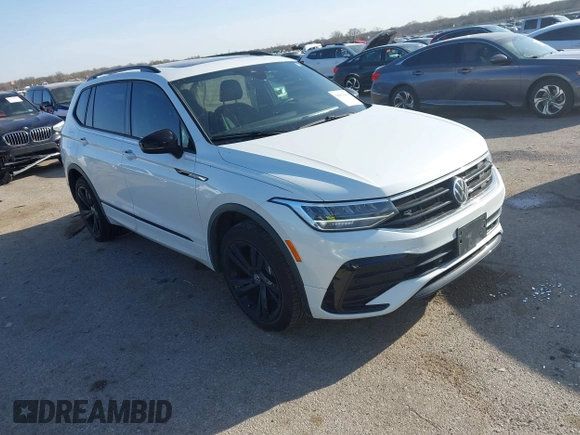 2024 Volkswagen Tiguan SE R-Line Black with VIN 3VVCB7AX0RM099863, listed as a IAAI auction lot 41851884 with 14,091 mi miles and . Bid and sale history available at DreamBid. Image 1.