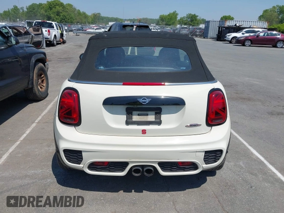2021 MINI Convertible with VIN WMWWJ9C0XM3M07302, listed as a IAAI auction lot 42027854 with 30,921 mi miles and . Bid and sale history available at DreamBid. Image 16.