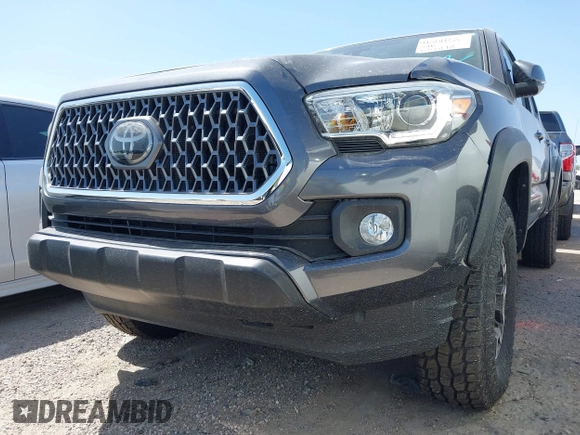 2018 Toyota Tacoma SR with VIN 5TFCZ5AN6JX127774, listed as a IAAI auction lot 41801158 with 28,161 mi miles and . Bid and sale history available at DreamBid. Image 17.