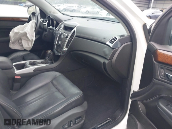 2012 Cadillac SRX Performance Collection with VIN 3GYFNBE38CS547423, listed as a IAAI auction lot 42276365 with 157,786 mi miles and . Bid and sale history available at DreamBid. Image 5.