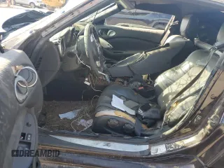 2010 Nissan 370Z Touring z VIN JN1AZ4EH5AM500829, wystawiony jako Copart lot #52824135 z przebiegiem Nie podano mil oraz Szkoda całkowita • Salvage title. Historia ofert i sprzedaży dostępna na DreamBid. Obrazek 7.