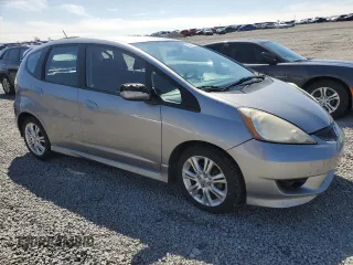 2009 Honda Fit Sport z VIN JHMGE88489S010278, wystawiony jako Copart lot #52251405 z przebiegiem 120 511 mil mil oraz Szkoda całkowita • Salvage title. Historia ofert i sprzedaży dostępna na DreamBid. Obrazek 4.
