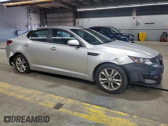 2011 Kia Optima EX with VIN KNAGN4A70B5071155, listed as a Copart auction lot 52201275 with 206,675 mi miles and Salvage Title. Bid and sale history available at carsss.com. Image 4.