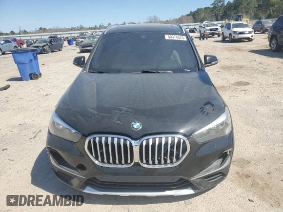 2021 BMW X1 xDrive28i z VIN WBXJG9C07M5S73464, wystawiony jako Copart lot #50374525 z przebiegiem 117 828 mil mil oraz Tytuł czysty. Historia ofert i sprzedaży dostępna na DreamBid. Obrazek 5.