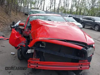 2014 Ford Mustang V6 z VIN 1ZVBP8AM3E5271971, wystawiony jako IAAI lot #42145670 z przebiegiem 77 466 mil mil oraz . Historia ofert i sprzedaży dostępna na DreamBid. Obrazek 13.