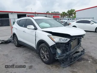 2014 Hyundai Santa Fe with VIN 5XYZU3LB9EG229255, listed as a IAAI auction lot 42407410 with 201,523 mi miles and . Bid and sale history available at DreamBid. Image 1.