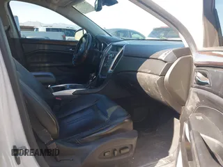 2012 Cadillac SRX Luxury Collection z VIN 3GYFNAE32CS518428, wystawiony jako IAAI lot #42153391 z przebiegiem 159 836 mil mil oraz . Historia ofert i sprzedaży dostępna na DreamBid. Obrazek 5.