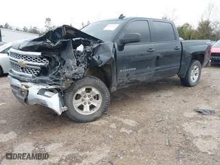 2015 Chevrolet Silverado 1500 LT with VIN 3GCUKREHXFG222242, listed as a IAAI auction lot 41572445 with 168,674 mi miles. Bid and sale history available at carsss.com. Image 2.