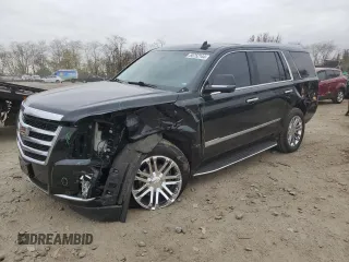 2019 Cadillac Escalade z VIN 1GYS4AKJ9KR133891, wystawiony jako Copart lot #80752144 z przebiegiem 77 000 mil mil oraz Szkody całkowita. Historia ofert i sprzedaży dostępna na DreamBid. Obrazek 1.