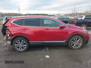 2020 Honda CR-V Touring with VIN 2HKRW2H96LH659793, listed as a IAAI auction lot 41145758 with 113,344 mi miles and . Bid and sale history available at DreamBid. Image 14.