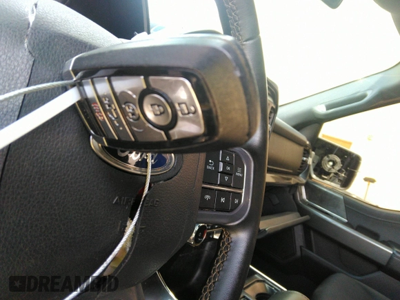 2023 Ford F-150 XL with VIN 1FTEW1C56PFC28013, listed as a IAAI auction lot 42242994 with Not provided miles and . Bid and sale history available at DreamBid. Image 11.