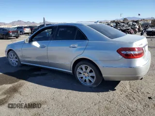 2012 Mercedes-Benz E with VIN WDDHF5KB1CA530298, listed as a Copart auction lot 48220155 with 71,797 mi miles and Salvage Title. Bid and sale history available at carsss.com. Image 2.
